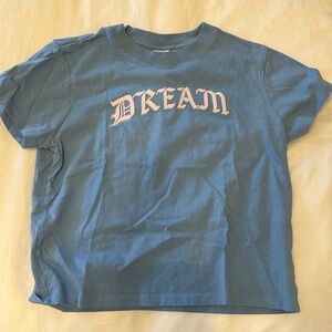 this is a cute baby tee from aritzia by the brand Sunday Best. It is a size xs.
